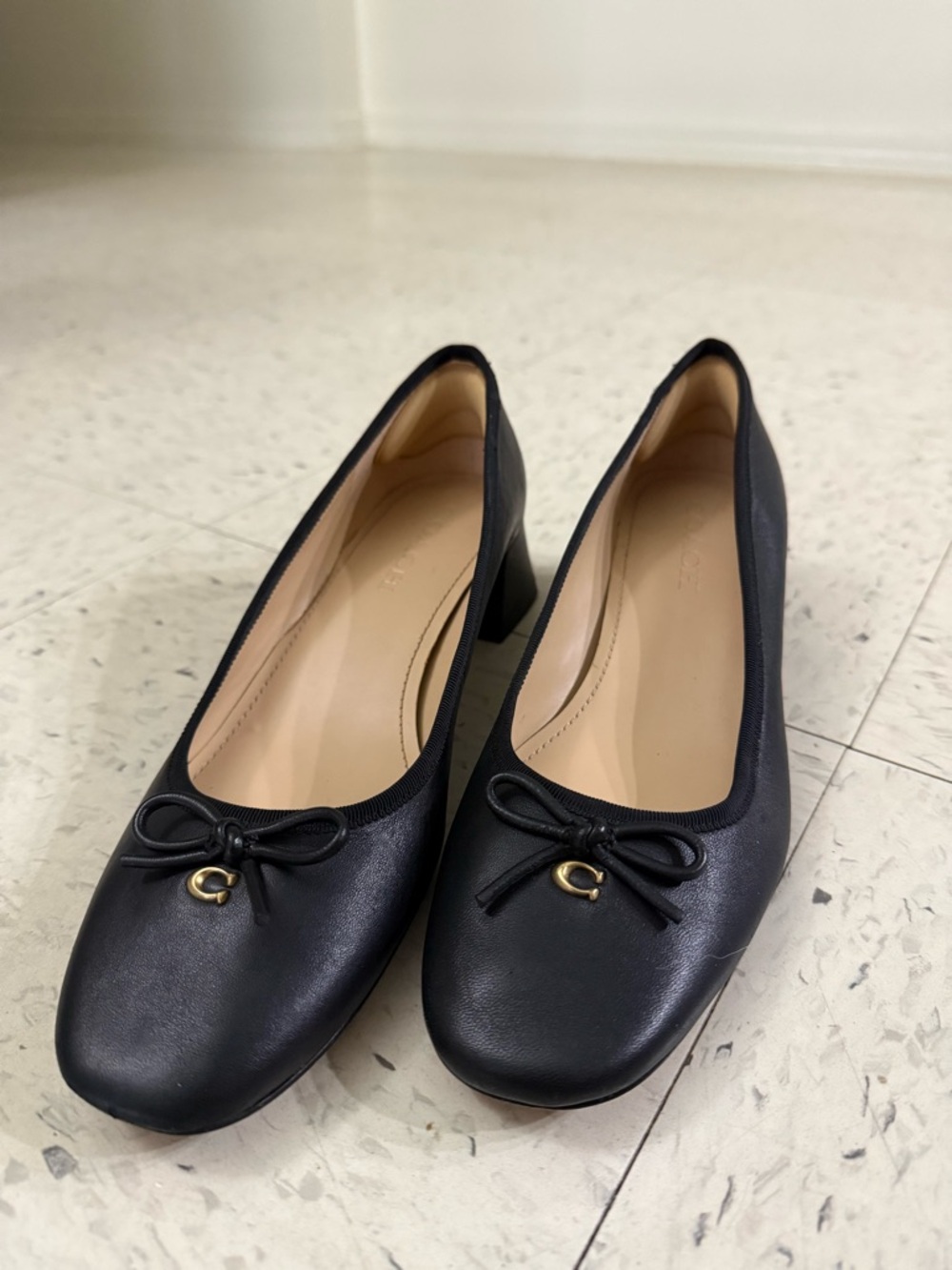 Coach Black Leather Ballet Heels with Bow and Gold 'C' Accent - Picture 2 of 9